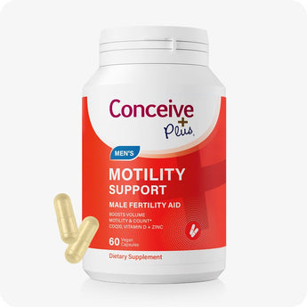 Conceive Plus Motility Support supplement bottle for men’s fertility, featuring a bold red and white label with words "Motility Support" visible, shown with two light-gold vegan capsules beside bottle, designed to support sperm motility, volume, and count with ingredients like CoQ10, Vitamin D, and Zinc.